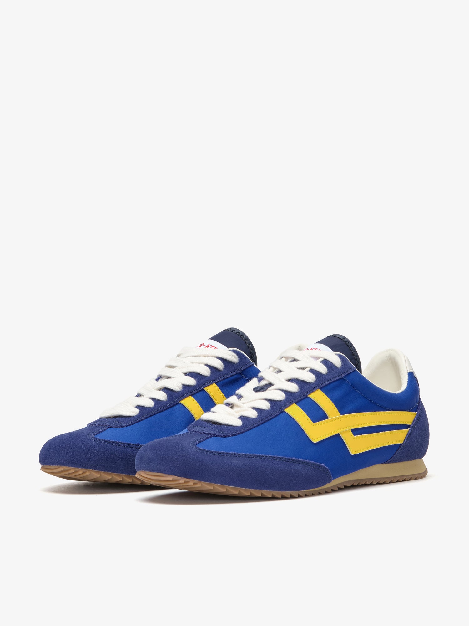Pro-Keds Racer 77 da uomo, sneaker blu e gialla, vista laterale con tomaia in nylon e inserti in suede e pelle