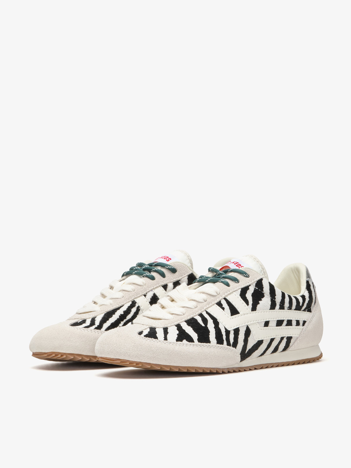 Pro-Keds Racer 77 da donna, paio di sneaker zebra e avorio, vista frontale e laterale